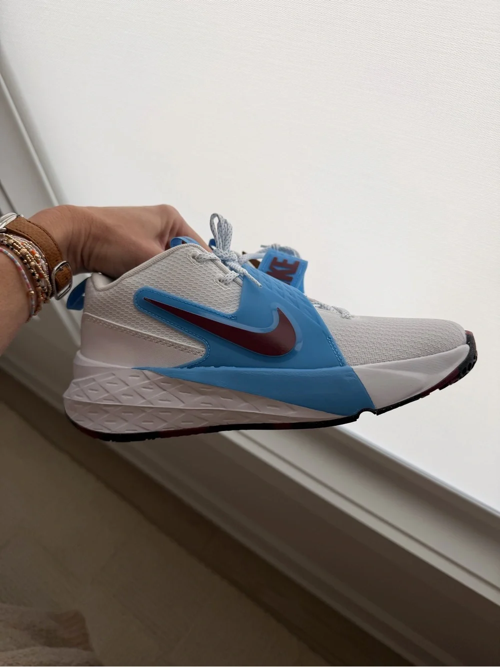 Nike Men's White and Blue Training Shoe with Maroon Swoosh Accent